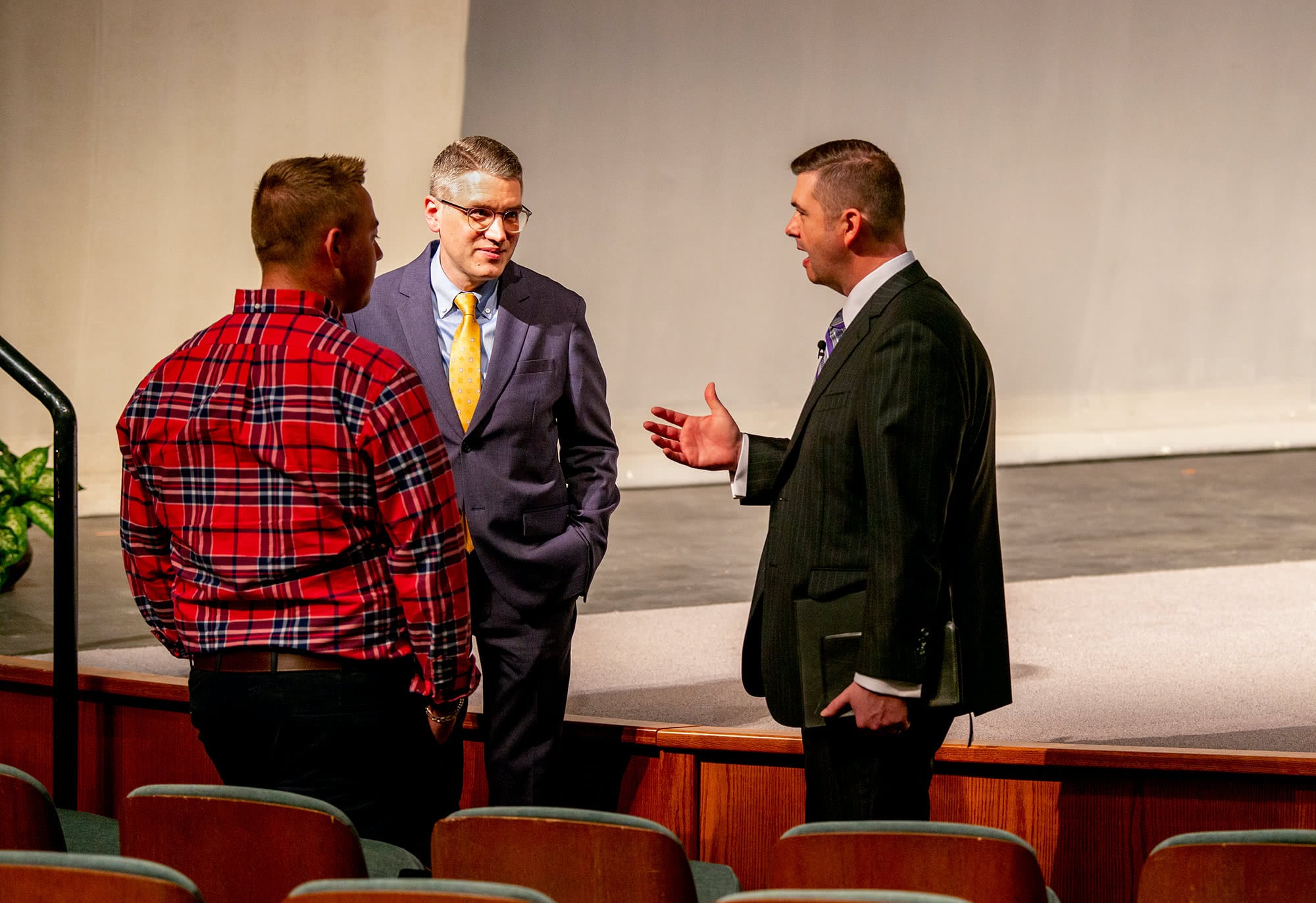 Dr. Folger speaking with Dr. Rushing and ministerial student