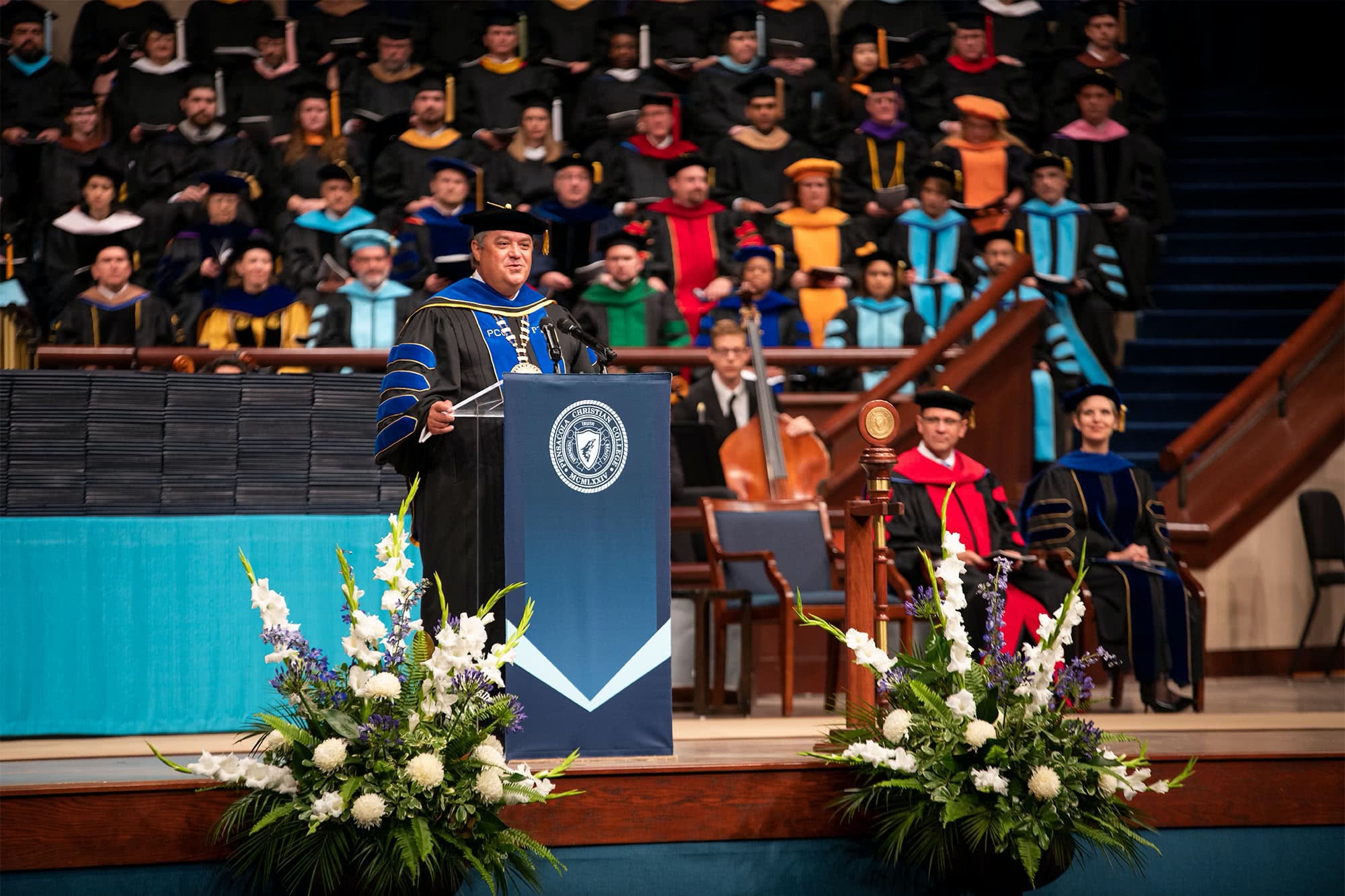 Dr. Shoemaker addresses the graduates