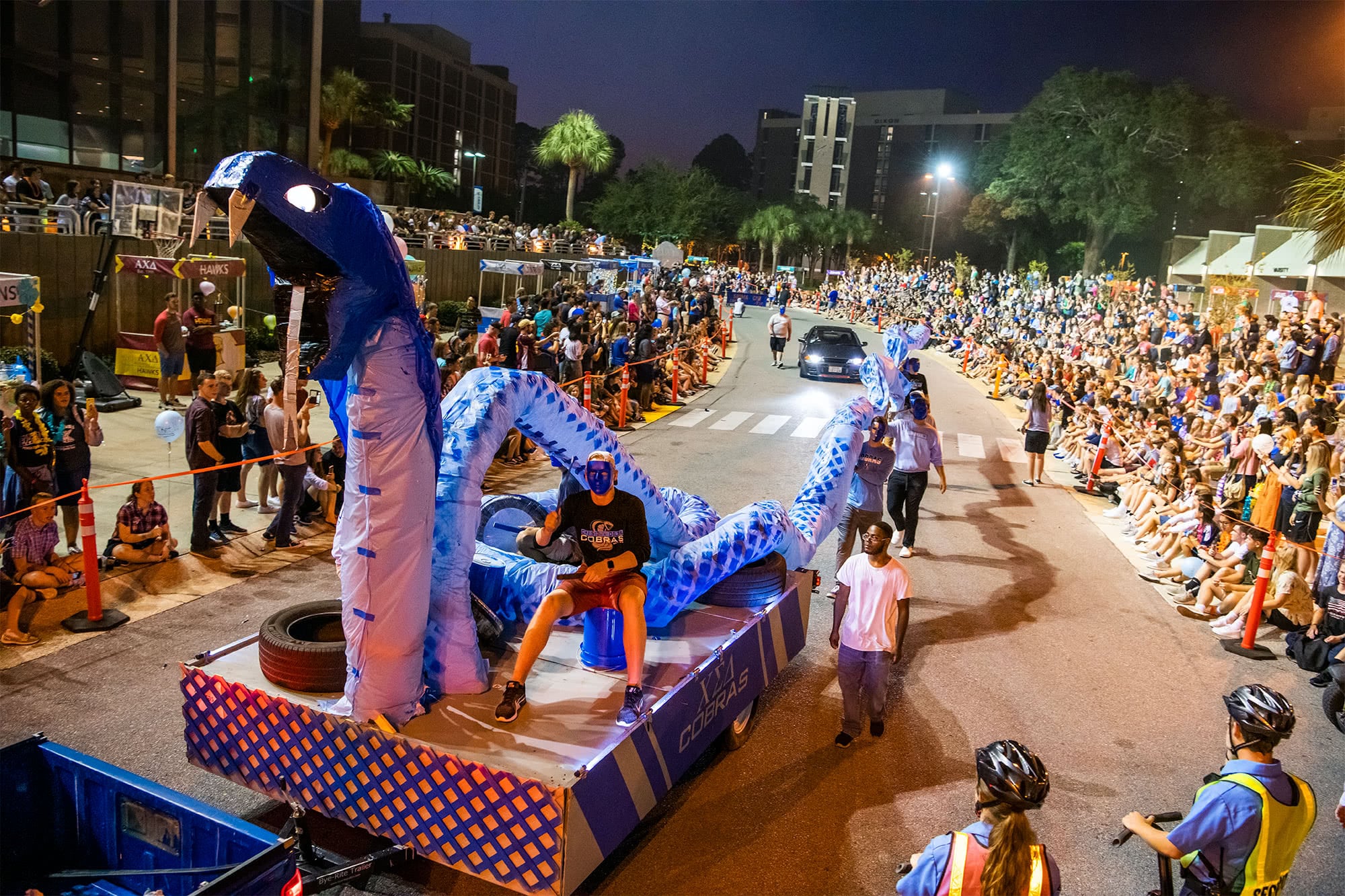 The cobras float include a cobra so large that four guys carried the tail behind the float