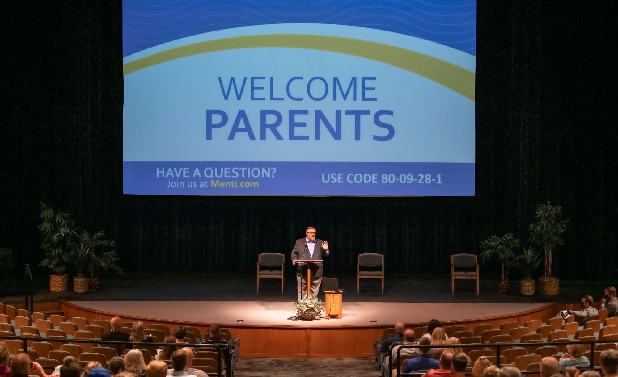 Dr. Troy Shoemaker giving a welcome message to parents in the Dale Horton Auditorium. 