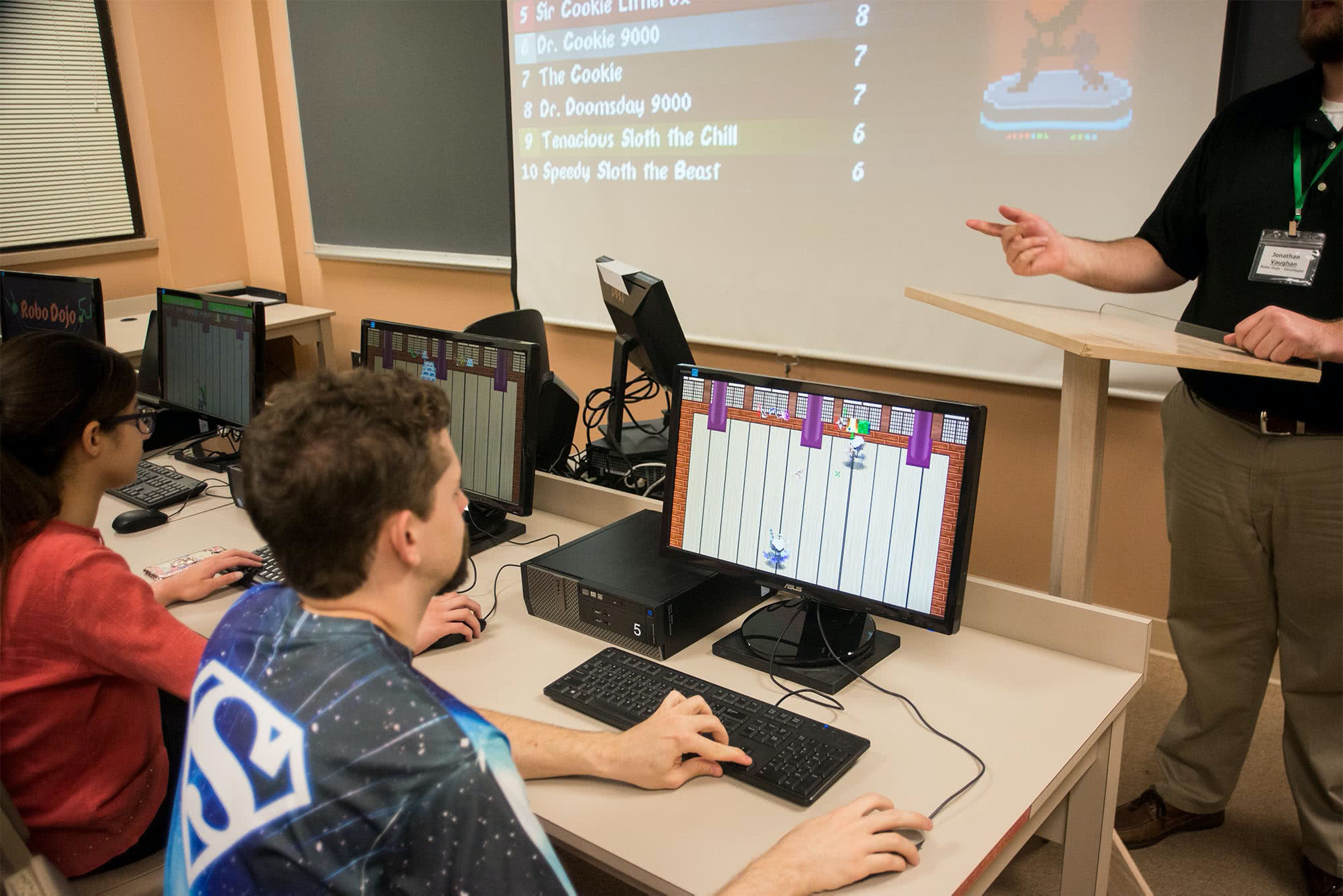 Students playing a student-created computer game. 