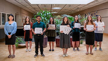 Eight PCC students pose with their Addy Awards