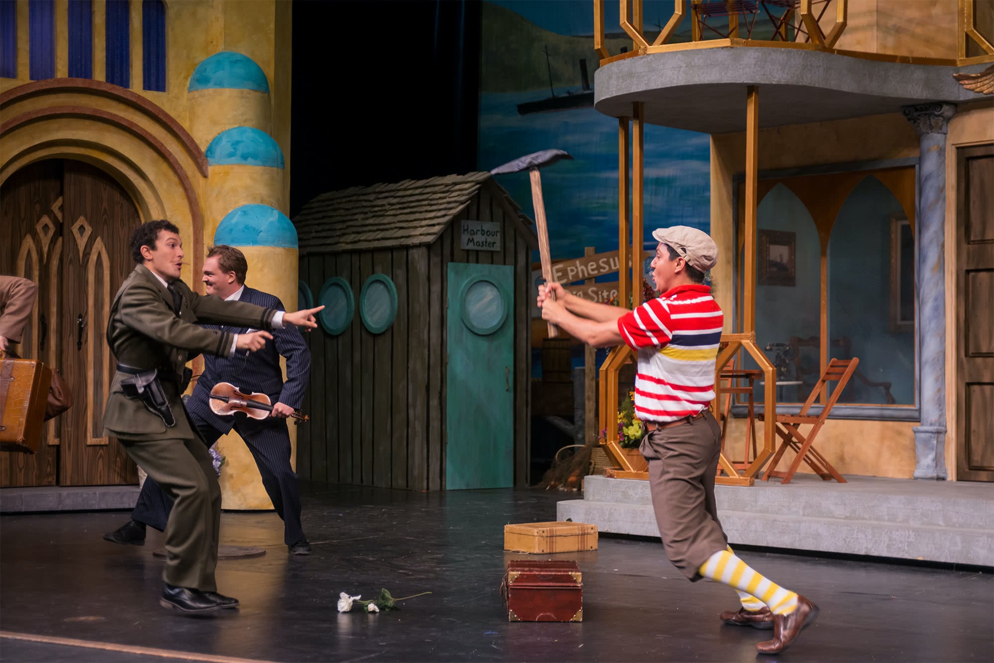 Comedy of errors characters fighting.