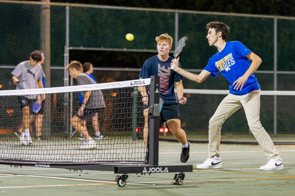 Students play tennis