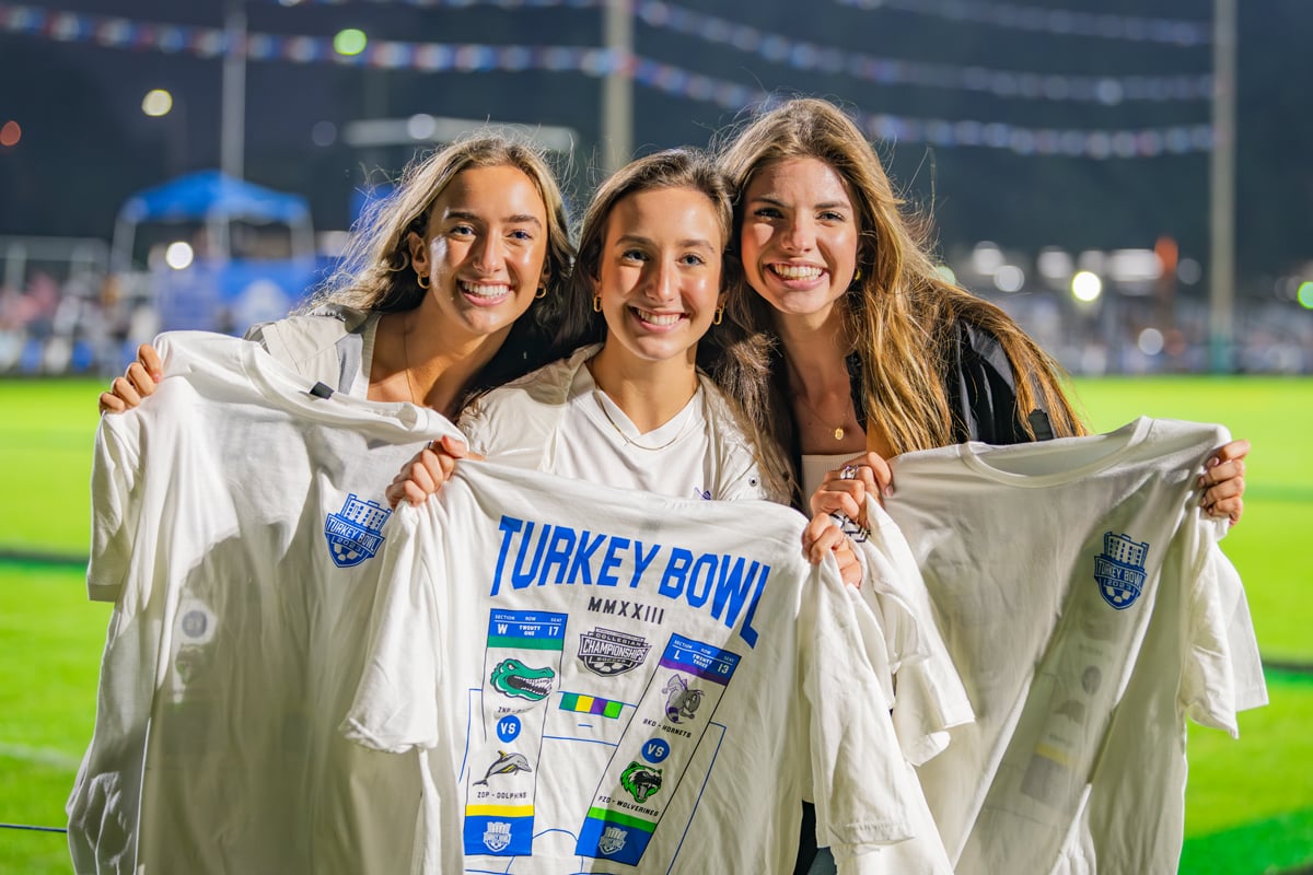PCC Students show their Turkey Bowl 2023 t-shirts